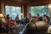 women sitting around at a retreat having a discussion 
