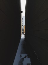 narrow space between buildings 