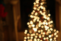 Christmas tree glowing with lights.
