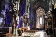 Inside of an elaborate cathedral.