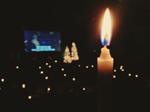 Candles burning at a Christmas Eve Service. 