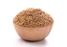 Pile of Ground Flax Seeds on a White Background
