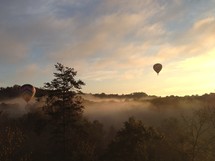 hot air balloons and mist 