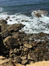 ocean water on rocks 