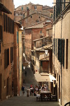 narrow alley between buildings in an Italian city