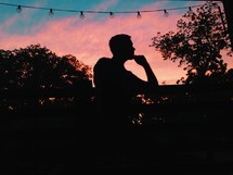 silhouette of a man thinking