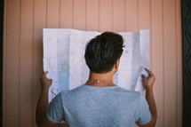 a man reading a map 