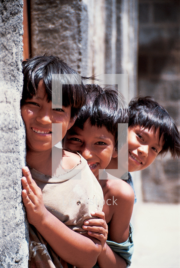 Three little boys smiling {Also try search for 'Ethnic Faces'} 