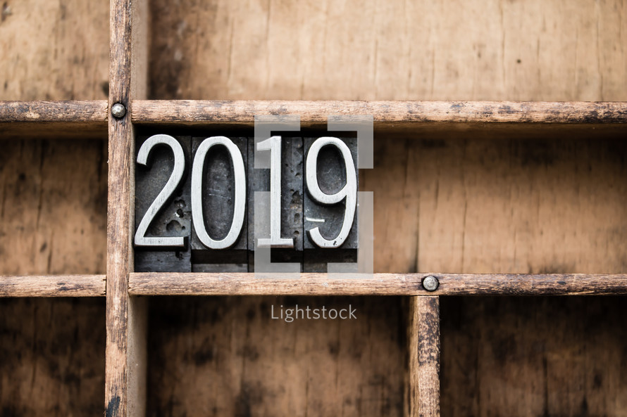 2019 blocks on bookshelf 