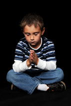 boy child with praying hands 