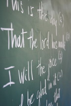 Scripture written on chalkboard