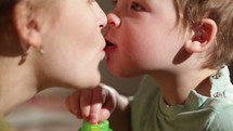 Mom and her son kissing lovely close ups