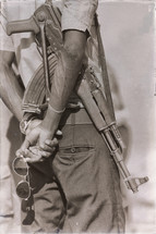 man holding a rifle 