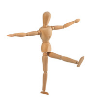 Wooden dummy in the balance on white background