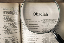 magnifying glass over Bible - Obadiah 