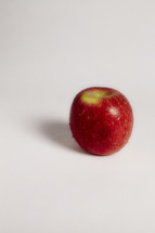 A red apple on seamless white