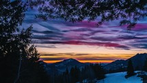 Colorful sunrise sky time lapse in beautiful forest country nature, travel adventure background
