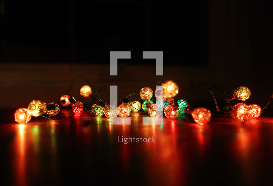 coloured Christmas lights on table