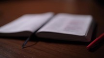 opened Bible on a desk 