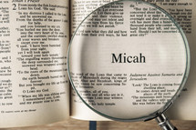 magnifying glass over Bible - Micah 
