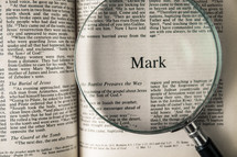Mark under a magnifying glass 