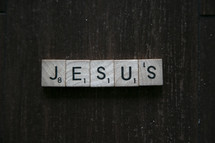 word Jesus in scrabble pieces 