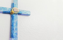 Turquoise blue cross with double exposure effect and copy space