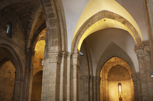 arched entryways in an old church 