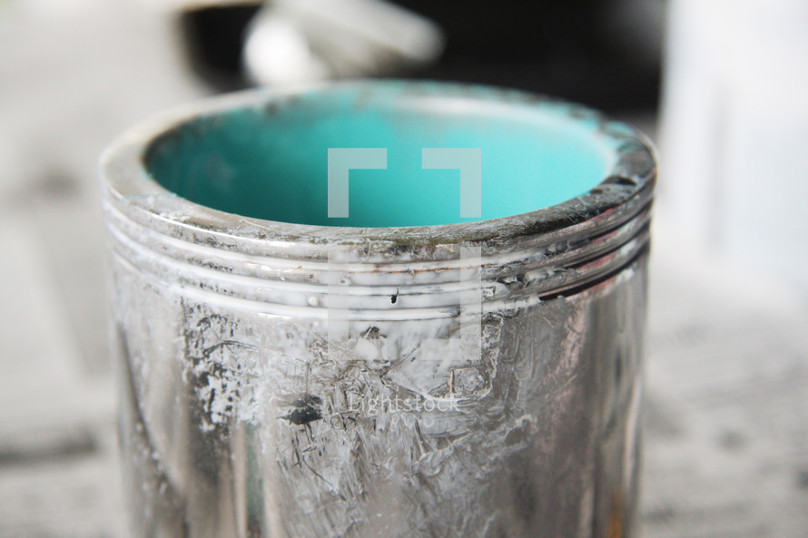 bucket of teal paint 