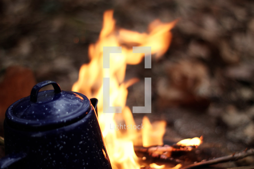 brewing coffee over a campfire 