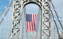 American Flag on a bridge