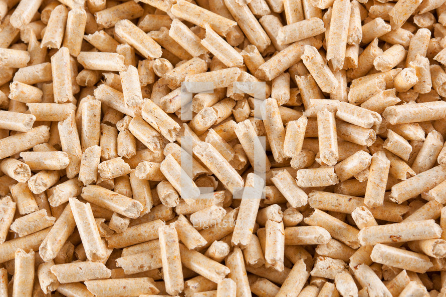 Wood pellets forming a background pattern