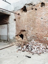 a crumbling brick wall 