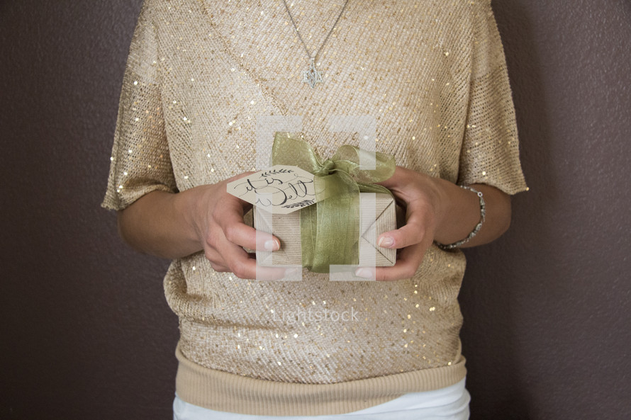 woman holding a gift 