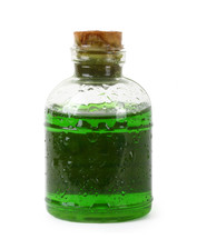 Bottle of green liquid isolated over white background