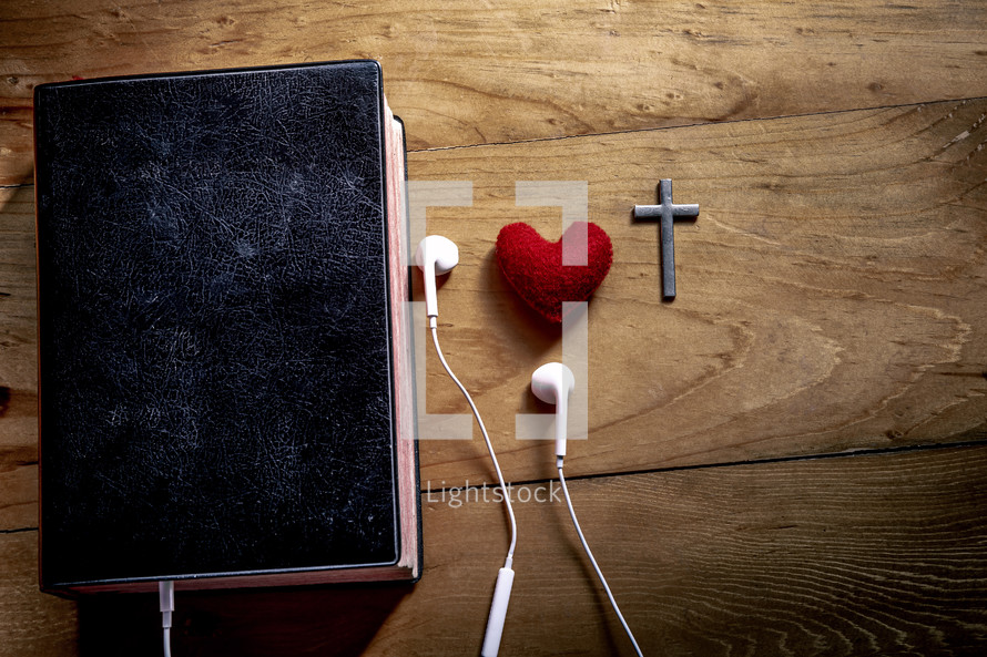 Bible with earbuds 