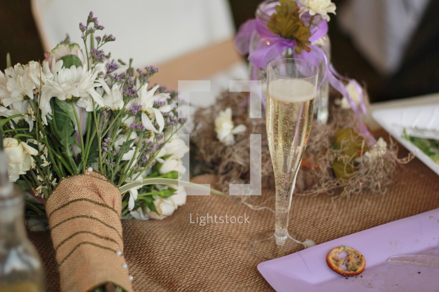 champagne, bouquet of flowers, place mat, wedding reception 