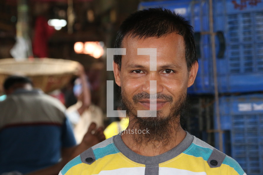 Face of a man with a beard and mustache in Bangladesh 