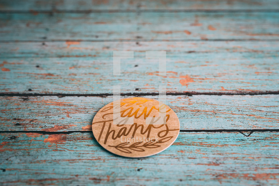 give thanks on teal wood boards 