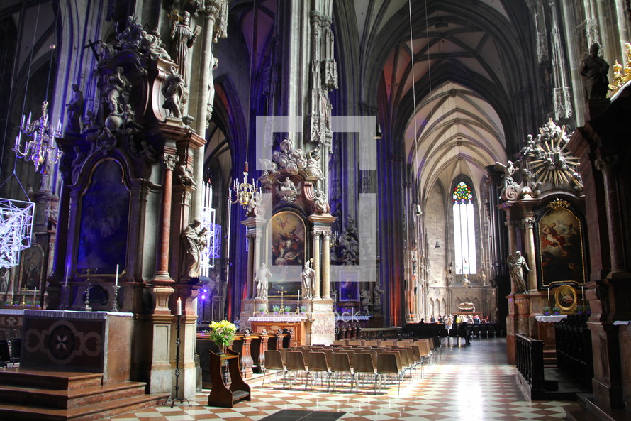 Inside of an elaborate cathedral.