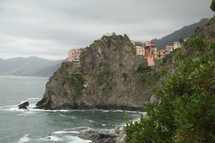 seaside European village on rocky cliffs