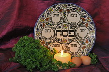 Jewish Passover Seder plate, parsley and eggs