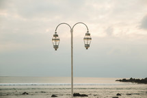 street lamp on a beach 