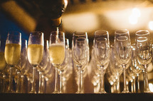 pouring champagne at a wedding reception 