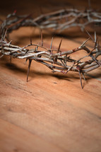 crown of thorns on a wood table 