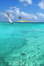 sailboat on a tropical beach 