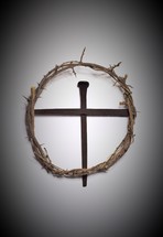 crown of thorns and nails in the shape of a cross 