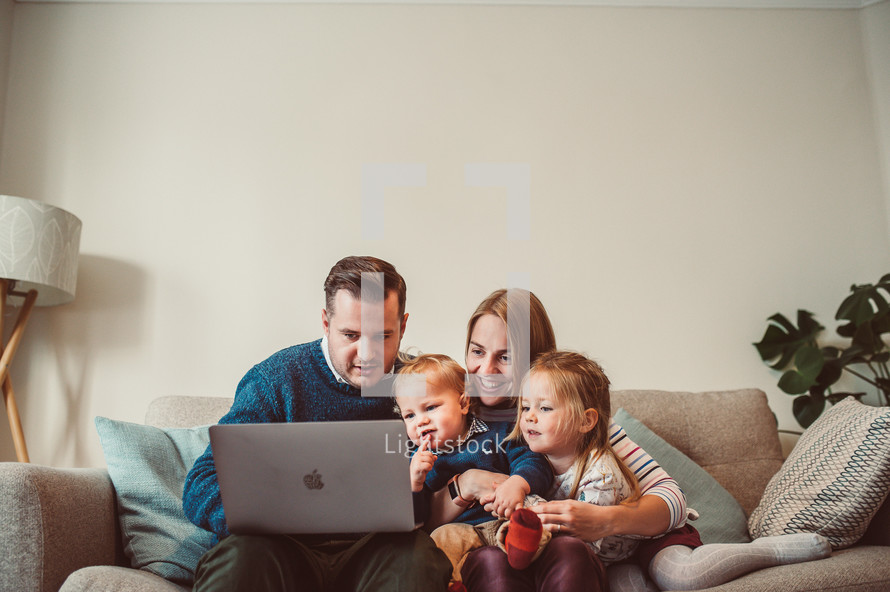 family watching a worship service online 
