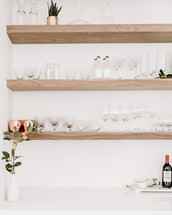 floating shelf with wine glasses 