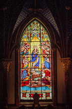 stained glass window of Mary